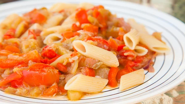 Vegetarian penne pasta dish — Stock Photo, Image