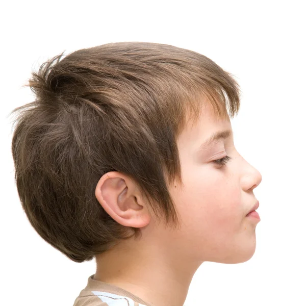 Haughty face; little boy poses against white background — Stock Photo, Image