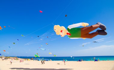 FUERTEVENTURA - NOVEMBER 13: Viewers watch from the ground as mu clipart