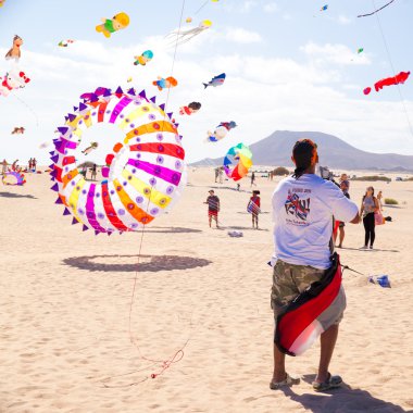 FUERTEVENTURA - NOVEMBER 13: Viewers watch from the ground as mu clipart