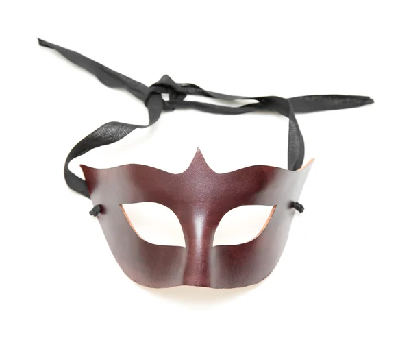 Meia máscara feita de couro marrom na superfície branca — Fotografia de Stock