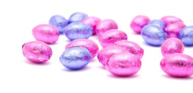 Chocolate easter eggs in pink and lilac foil