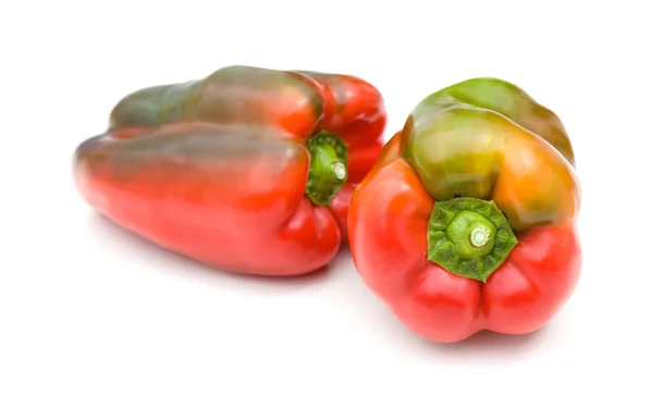 Beautiful colorful red and green sweet peppers on white backgrou — Stock Photo, Image