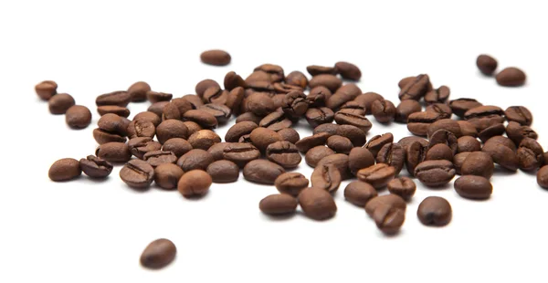 Жменька кавових зерен — стокове фото