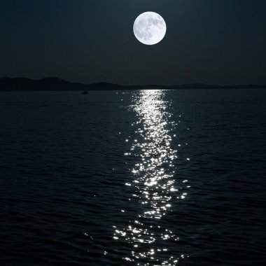 Full moon over sea