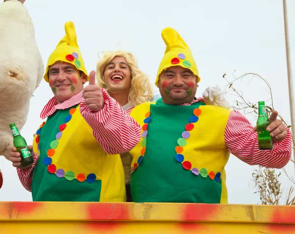 stock image CORRALEJO - MARCH 17: Dressed-up participants on a carnival Floa