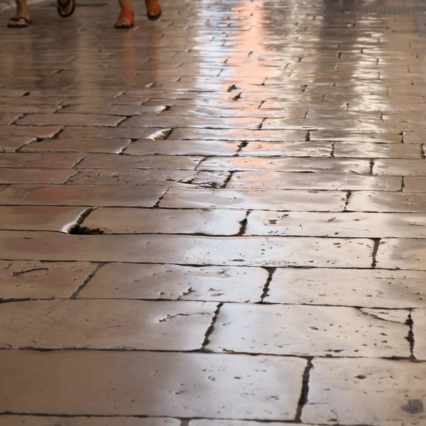 Highly polished flagstones of an old street in Croatia (Zadar) — Stock Photo, Image