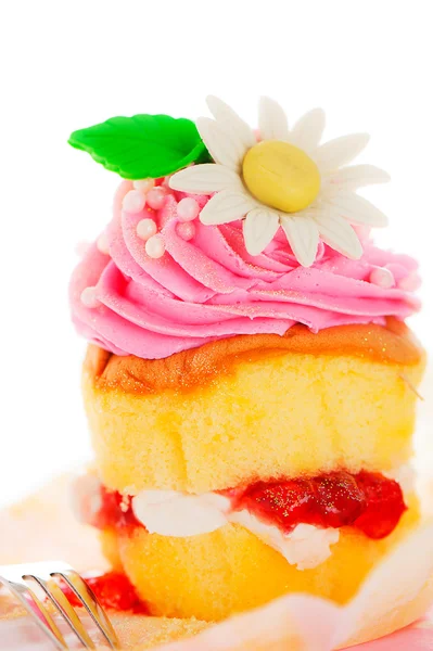 En två lager cupcake med rosa och vita buttercream socker blomma — Stockfoto
