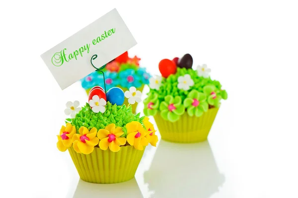 stock image Happy easter cupcake with chocolate egg and cream grass as a mea