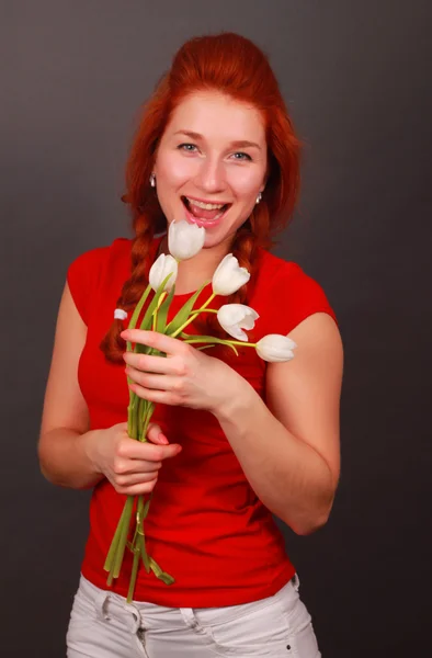 Kobieta z kwiatami — Zdjęcie stockowe