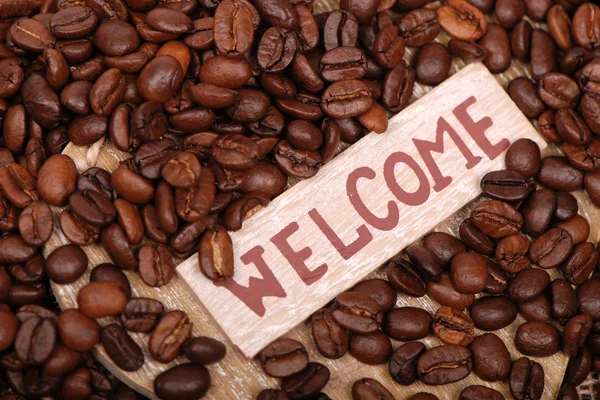 Latar belakang biji kopi panggang pada tema makanan dengan kata "selamat datang " — Stok Foto