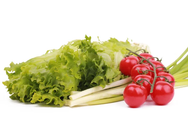 stock image Leaves of lettuce, leek and cherry tomatoes