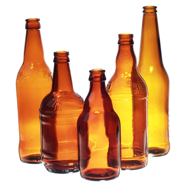 Five brown bottles — Stock Photo, Image