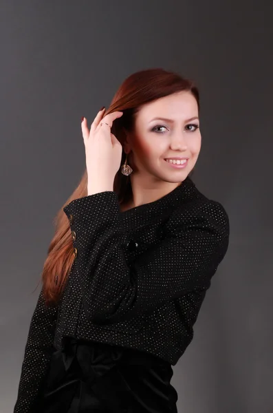 Young woman in black — Stock Photo, Image