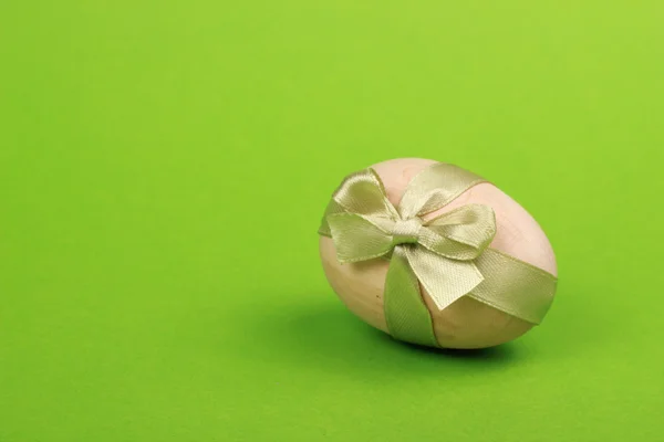 Easter egg with a ribbon — Stock Photo, Image