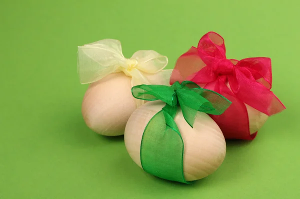 Wooden egg with ribbon — Stock Photo, Image