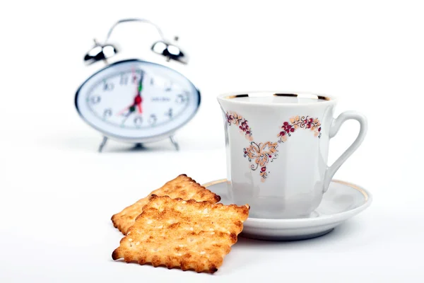 Kopje koffie en horloge close-up — Stockfoto