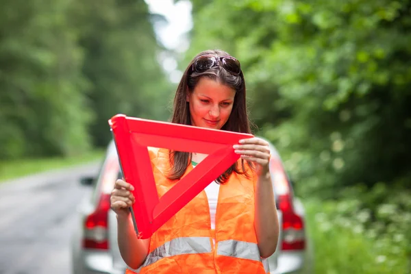 Young female driver after her car has broken down — Stock Photo, Image