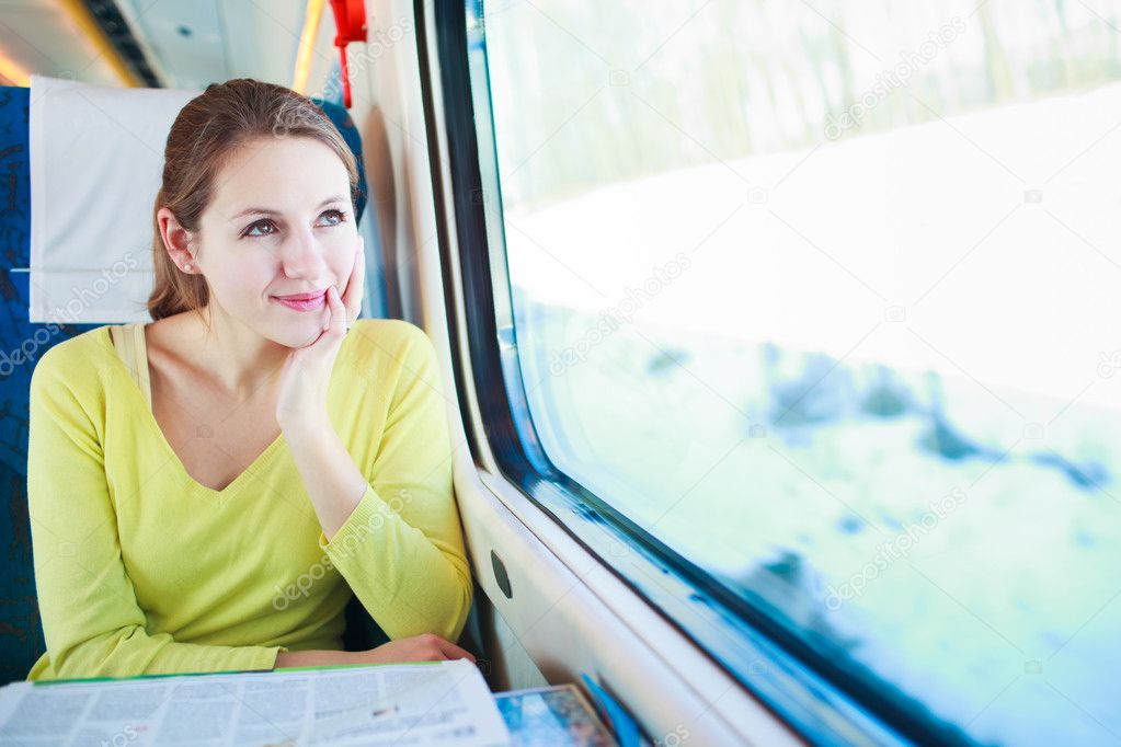 Young woman traveling by train Stock Photo by ©lightpoet 10407971