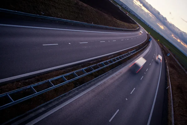 Highway traffic - motion blurred truck on a highway — Stock Photo, Image