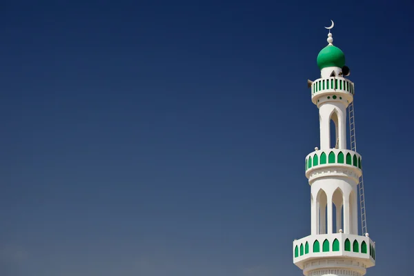 stock image White mosque with minaret against blue sky (Sur, Oman)