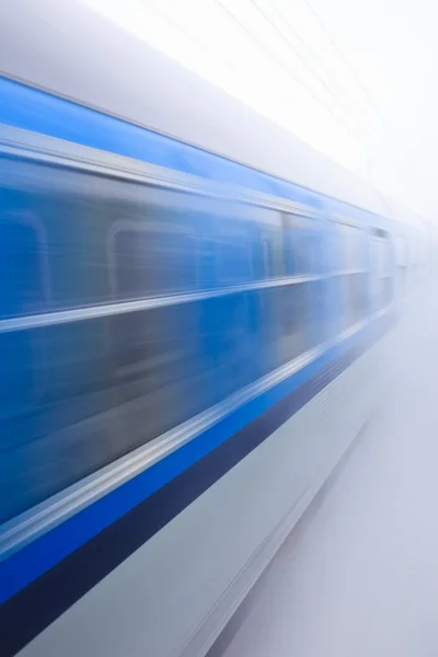 Train going fast in a snow storm — Stock Photo, Image