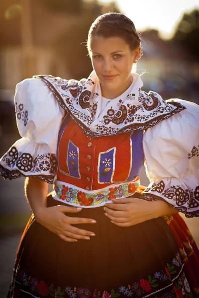 stock image Young woman in a richly decorated ceremonial folk dress