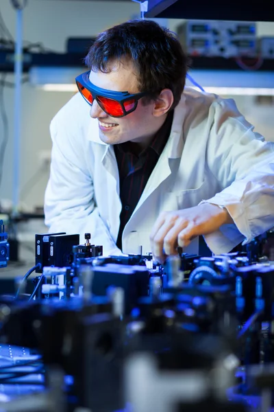 Scientist doing research in a quantum optics lab — Stock Photo, Image