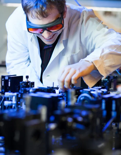 Scientist doing research in a quantum optics lab — Stock Photo, Image