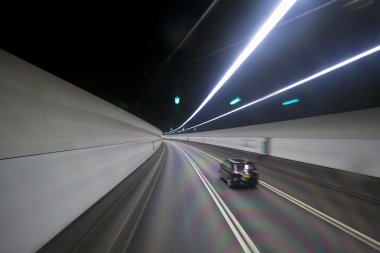 Tunnel and moving cars in Hong Kong clipart