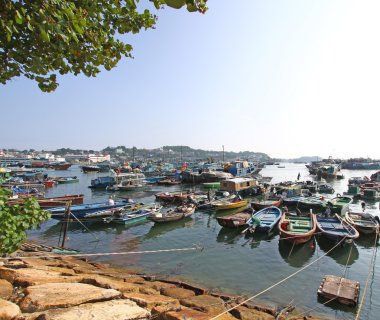 Cheung Chau fishing boats along the coast in Hong Kong clipart