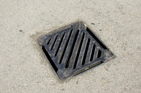 Drainage system the manhole on floor — Stock Photo, Image