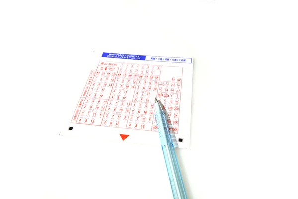 Loterij met pen op witte achtergrond — Stockfoto