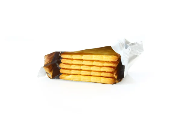 Pila de galletas en bolsa aislada sobre fondo blanco — Foto de Stock