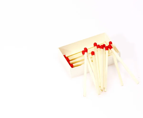Matchs rouges isolés sur fond blanc — Photo