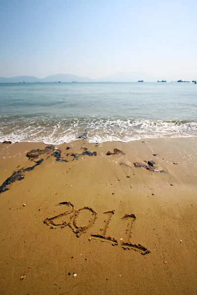 2011 geschreven op zand — Stockfoto