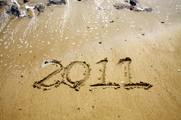 2011 scritto sulla sabbia — Foto Stock