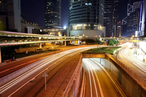 Traffic in modern city at night — Stock Photo, Image