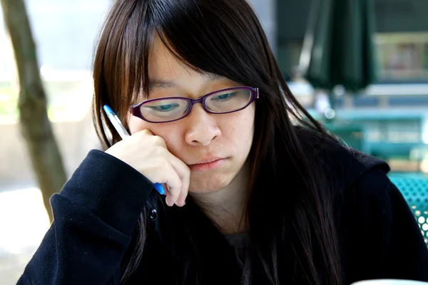 Asian girl thinking — Stock Photo, Image