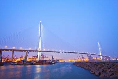 Hong Kong bridge at sunset clipart