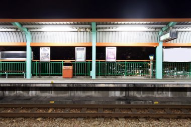 Train station in Hong Kong at night clipart