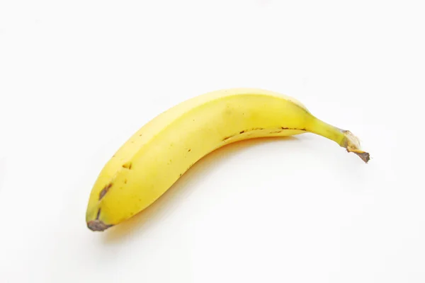 Banana isolada sobre fundo branco — Fotografia de Stock