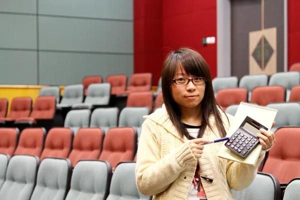 Asian student in lecture hall — Stock Photo, Image