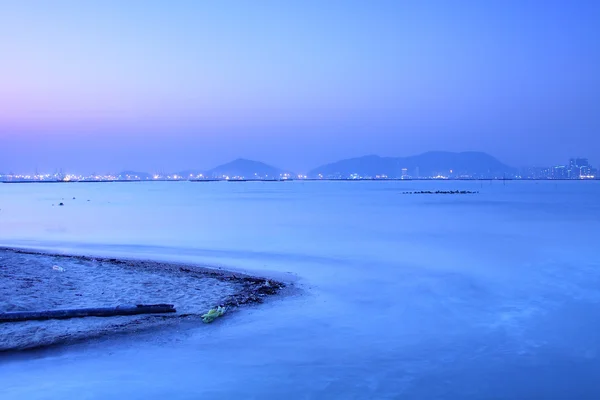 Pôr do sol ao longo da costa em Hong Kong no inverno — Fotografia de Stock