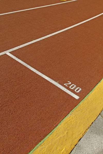 Running track in a stadium with number 200