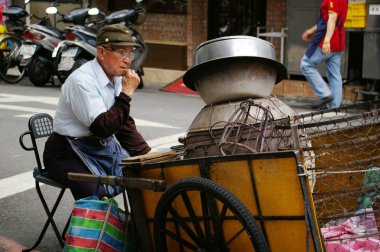 Taiwan hawker along the street clipart