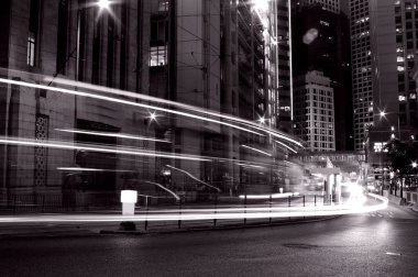 Busy traffic in Hong Kong at night in black and white clipart