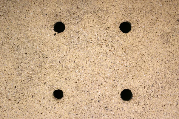 Cuatro agujeros en el fondo del suelo — Foto de Stock