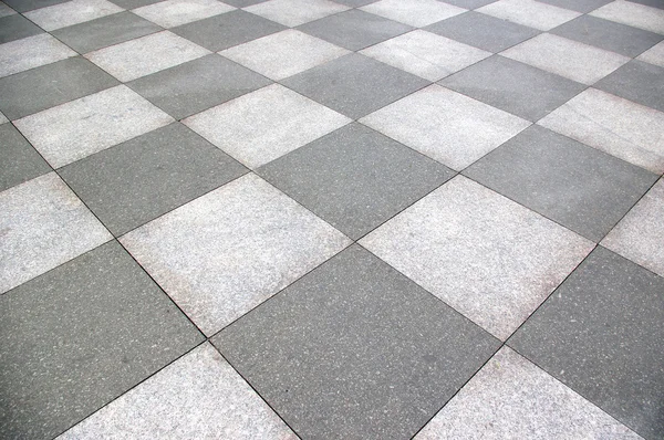 Grijs en wit betegelde vloer — Stockfoto