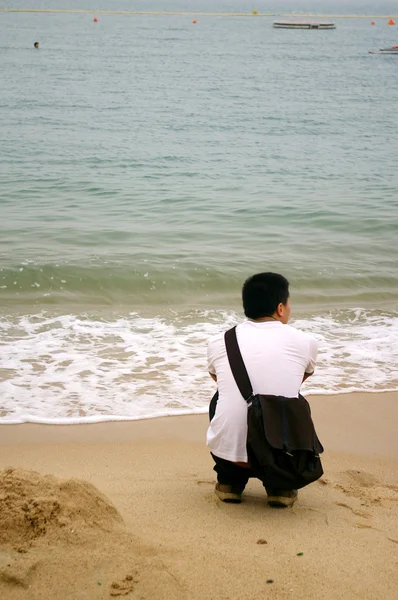 Самотня людина азіатських — стокове фото